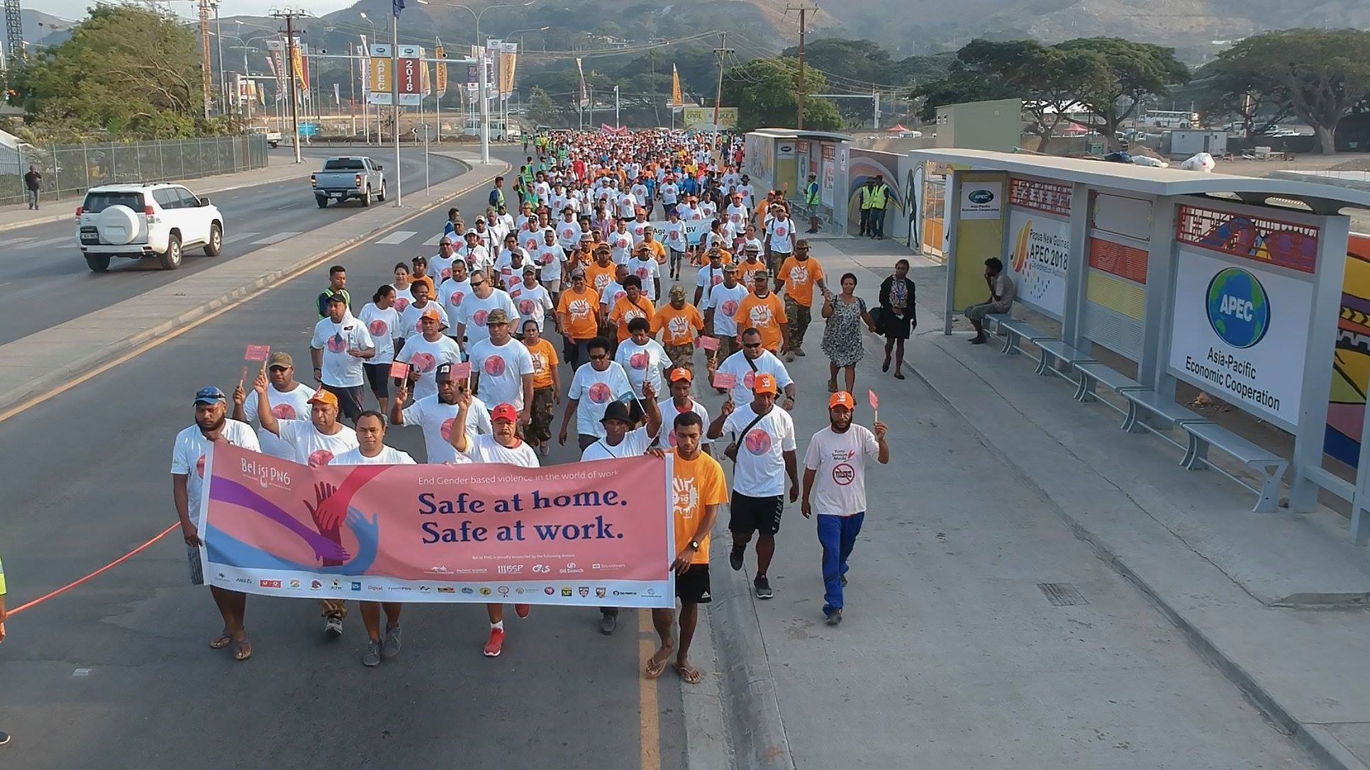 Group of people participating in walk against gender based violence
