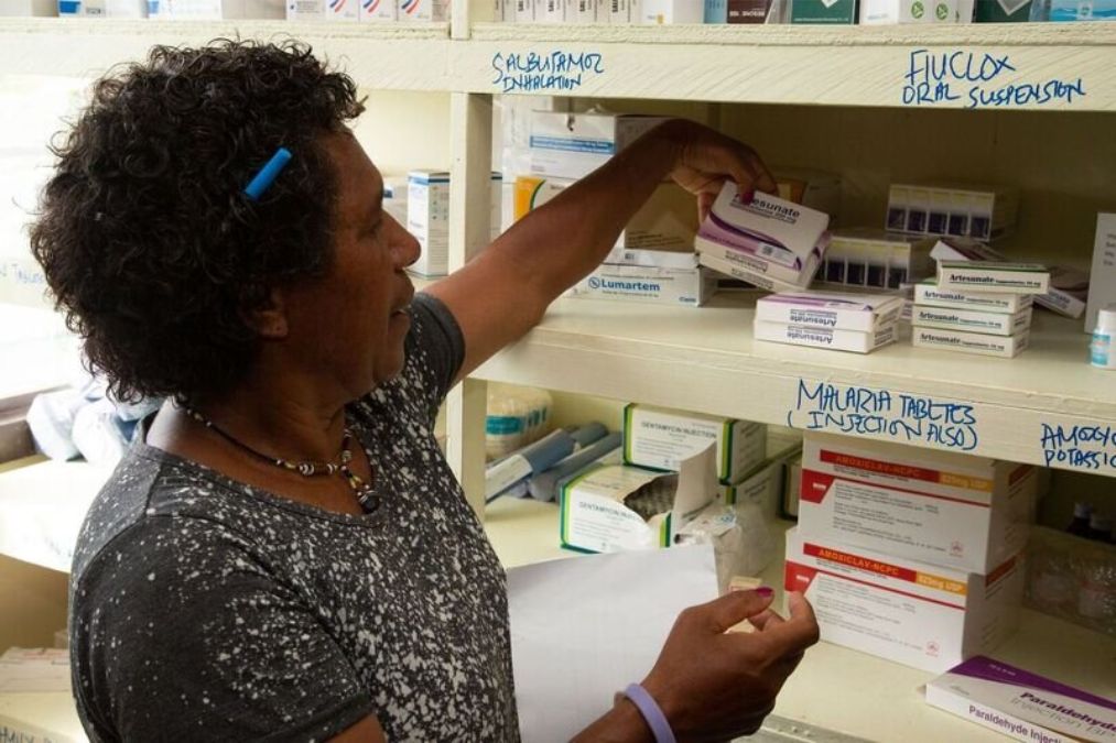community health worker completing a stock take